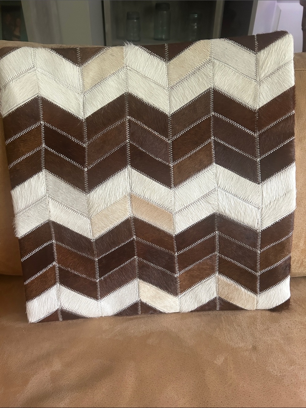 Cowhide Chevron Patchwork Throw Pillow Cover with genuine leather back.